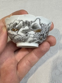 A set of four Chinese gilt-decorated grisaille 'landscape' cups and saucers, Yongzheng/Qianlong
