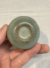 A small and rare Chinese Longquan celadon quadruple-neck vase, Song/Yuan