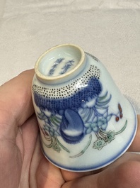 A pair of Chinese doucai 'narcissus' wine cups, Guangxu mark and of the period