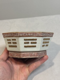 A Chinese iron-red gilt-decorated octagonal 'trigrams' bowl, Tongzhi mark and of the period
