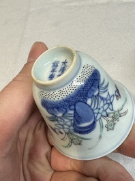 A pair of Chinese doucai 'narcissus' wine cups, Guangxu mark and of the period