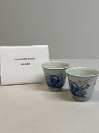 A pair of Chinese doucai 'narcissus' wine cups, Guangxu mark and of the period