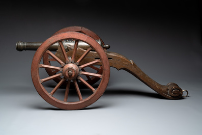 A Dutch bronze saluting cannon on a partly original carriage, inscribed C. Ouderogge Fecit, Rotterdam, dated 1641