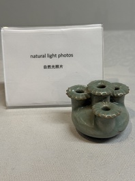 A small and rare Chinese Longquan celadon quadruple-neck vase, Song/Yuan