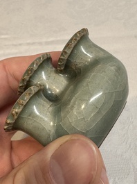 A small and rare Chinese Longquan celadon quadruple-neck vase, Song/Yuan