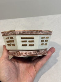 A Chinese iron-red gilt-decorated octagonal 'trigrams' bowl, Tongzhi mark and of the period
