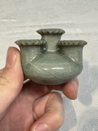 A small and rare Chinese Longquan celadon quadruple-neck vase, Song/Yuan
