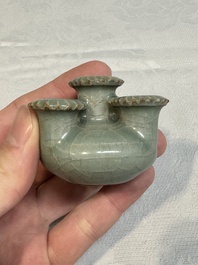 A small and rare Chinese Longquan celadon quadruple-neck vase, Song/Yuan