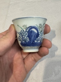 A pair of Chinese doucai 'narcissus' wine cups, Guangxu mark and of the period