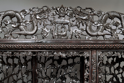 A richly carved Chinese hongmu display cabinet, Canton, 19th C.
