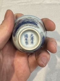 A pair of Chinese doucai 'narcissus' wine cups, Guangxu mark and of the period
