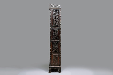 A richly carved Chinese hongmu display cabinet, Canton, 19th C.