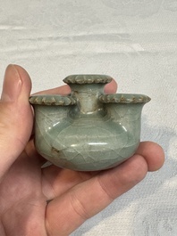 A small and rare Chinese Longquan celadon quadruple-neck vase, Song/Yuan