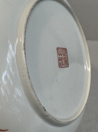 A Chinese famille rose 'bats and peaches' plate, Xie Zhu Zhu Ren 薢竹主人造 mark, 19th C.