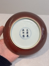 A Chinese copper-red glazed plate, Kangxi mark, 19/20th C.