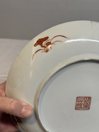 A Chinese famille rose 'bats and peaches' plate, Xie Zhu Zhu Ren 薢竹主人造 mark, 19th C.