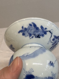 A Chinese blue and white spittoon with figural design, Kangxi