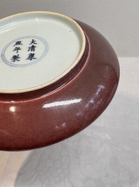 A Chinese copper-red glazed plate, Kangxi mark, 19/20th C.