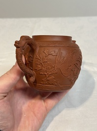 A Chinese Yixing stoneware 'phoenixes and peonies' teapot and cover, Kangxi