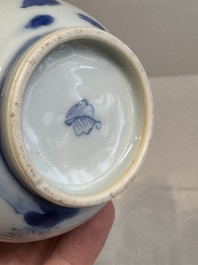 A Chinese blue and white spittoon with figural design, Kangxi