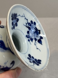 A Chinese blue and white spittoon with figural design, Kangxi