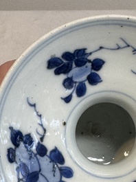 A Chinese blue and white spittoon with figural design, Kangxi