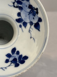 A Chinese blue and white spittoon with figural design, Kangxi