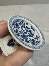 A pair of Chinese blue and white salts and a reticulated double-walled cup, Kangxi
