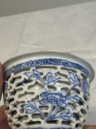 A pair of Chinese blue and white salts and a reticulated double-walled cup, Kangxi