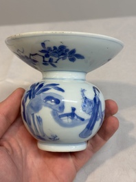 A Chinese blue and white spittoon with figural design, Kangxi