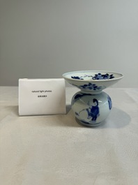 A Chinese blue and white spittoon with figural design, Kangxi