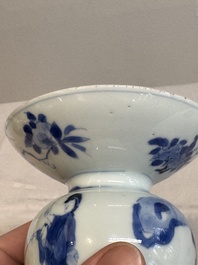 A Chinese blue and white spittoon with figural design, Kangxi