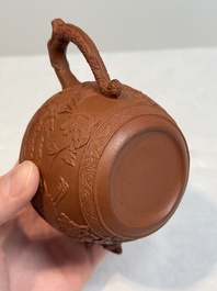 A Chinese Yixing stoneware 'phoenixes and peonies' teapot and cover, Kangxi