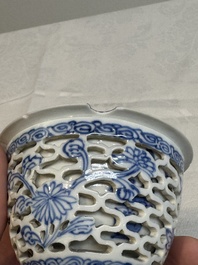 A pair of Chinese blue and white salts and a reticulated double-walled cup, Kangxi