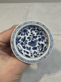 A pair of Chinese blue and white salts and a reticulated double-walled cup, Kangxi
