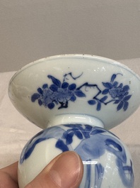A Chinese blue and white spittoon with figural design, Kangxi