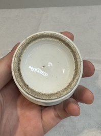 A pair of Chinese blue and white salts and a reticulated double-walled cup, Kangxi