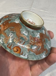 A Chinese fencai gilt-decorated 'dragons on waves' bowl and cover, Jiaqing mark, 19th C.