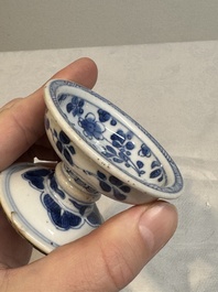 A pair of Chinese blue and white salts and a reticulated double-walled cup, Kangxi
