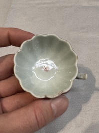 Two small Chinese famille verte handled cups with 'prunus on cracked ice' and 'shou' design, Kangxi
