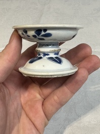 A pair of Chinese blue and white salts and a reticulated double-walled cup, Kangxi