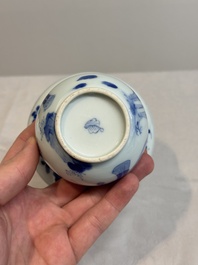 A Chinese blue and white spittoon with figural design, Kangxi