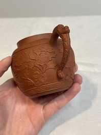 A Chinese Yixing stoneware 'phoenixes and peonies' teapot and cover, Kangxi