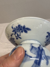A Chinese blue and white spittoon with figural design, Kangxi