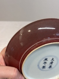 A Chinese copper-red glazed plate, Kangxi mark, 19/20th C.
