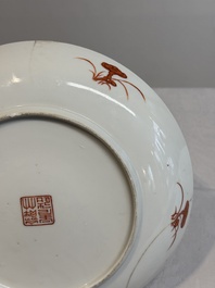A Chinese famille rose 'bats and peaches' plate, Xie Zhu Zhu Ren 薢竹主人造 mark, 19th C.
