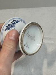 A pair of Chinese blue and white salts and a reticulated double-walled cup, Kangxi