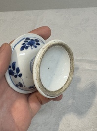 A pair of Chinese blue and white salts and a reticulated double-walled cup, Kangxi