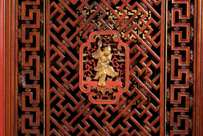 A large and fine Chinese gilt-red-lacquered cabinet with figures and antiquities, 19th C.
