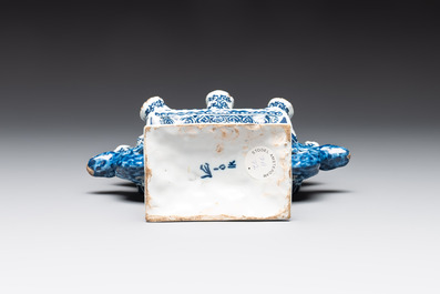 A pair of blue and white Dutch Delft heart-shaped tulip vases, early 18th C.